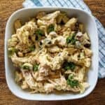 curry chicken salad with grapes in bowl.
