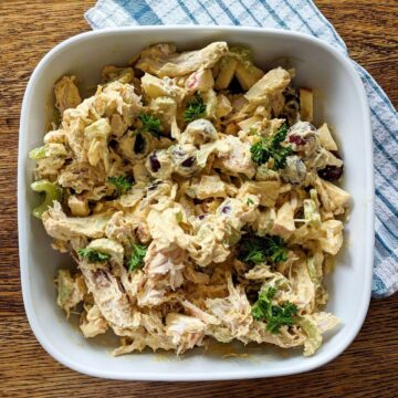 curry chicken salad with grapes in bowl.