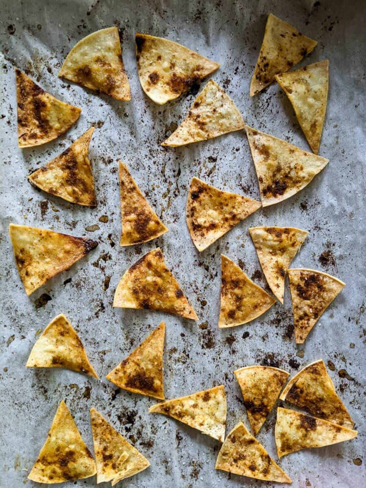 homemade tortilla chips on pan.