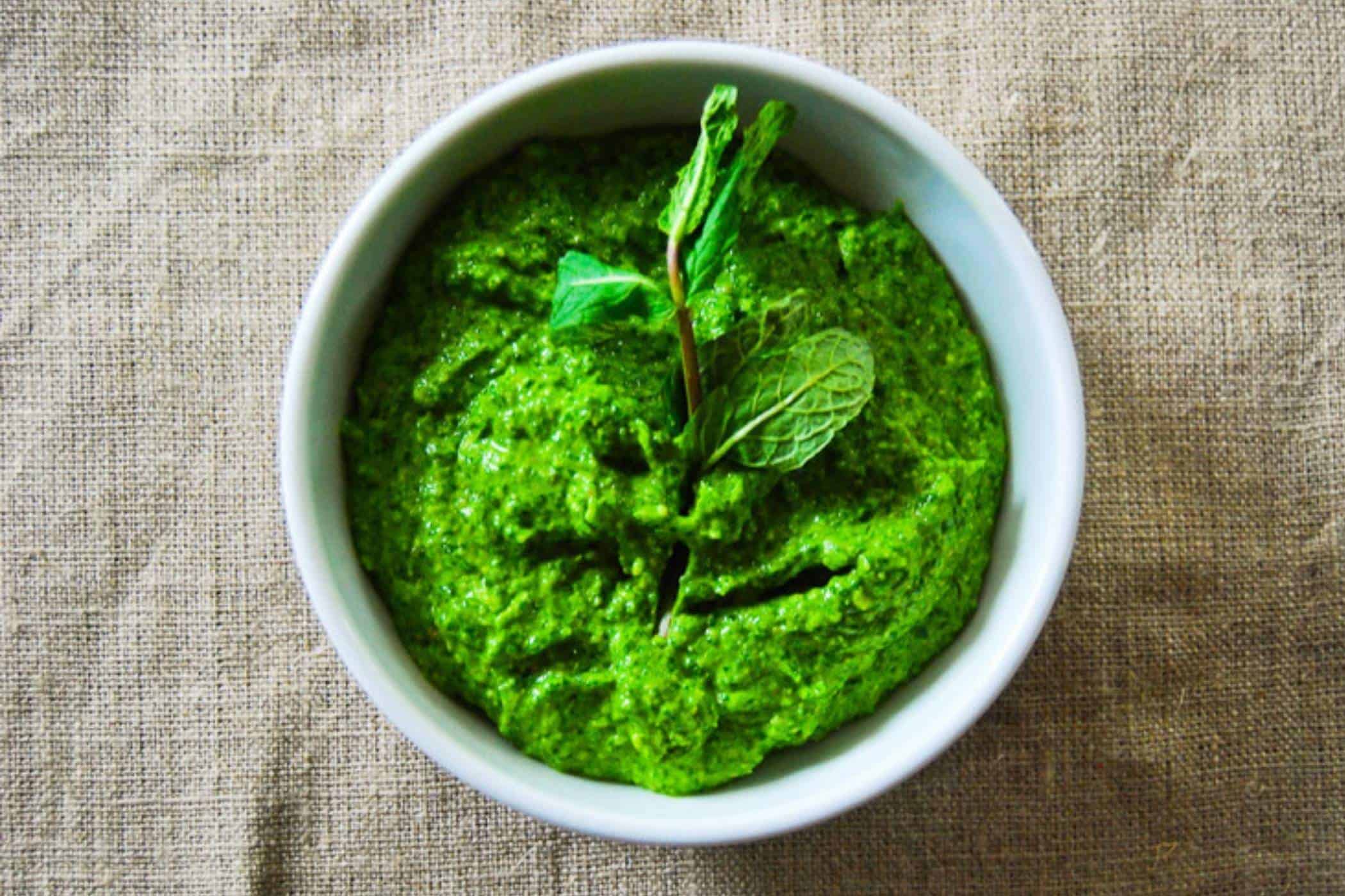 homemade pesto sauce in bowl.