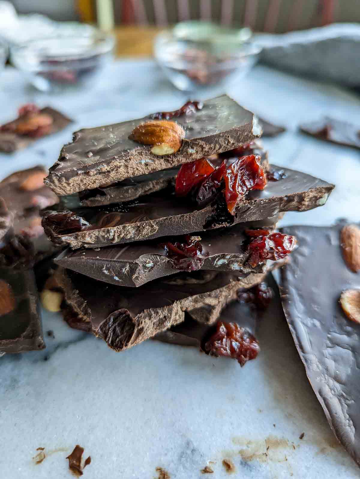 stacked chocolate bark with cherry and almonds.