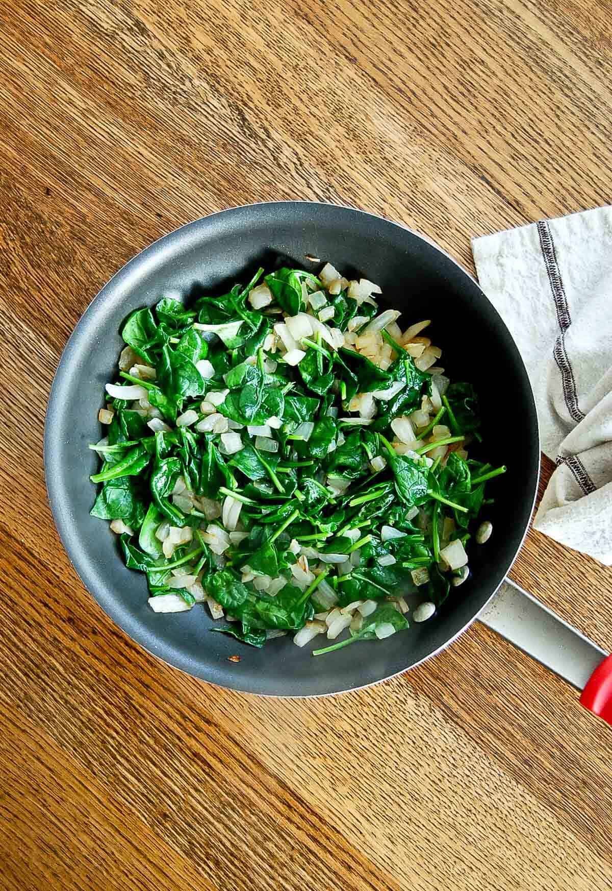 cooked spinach and onions.