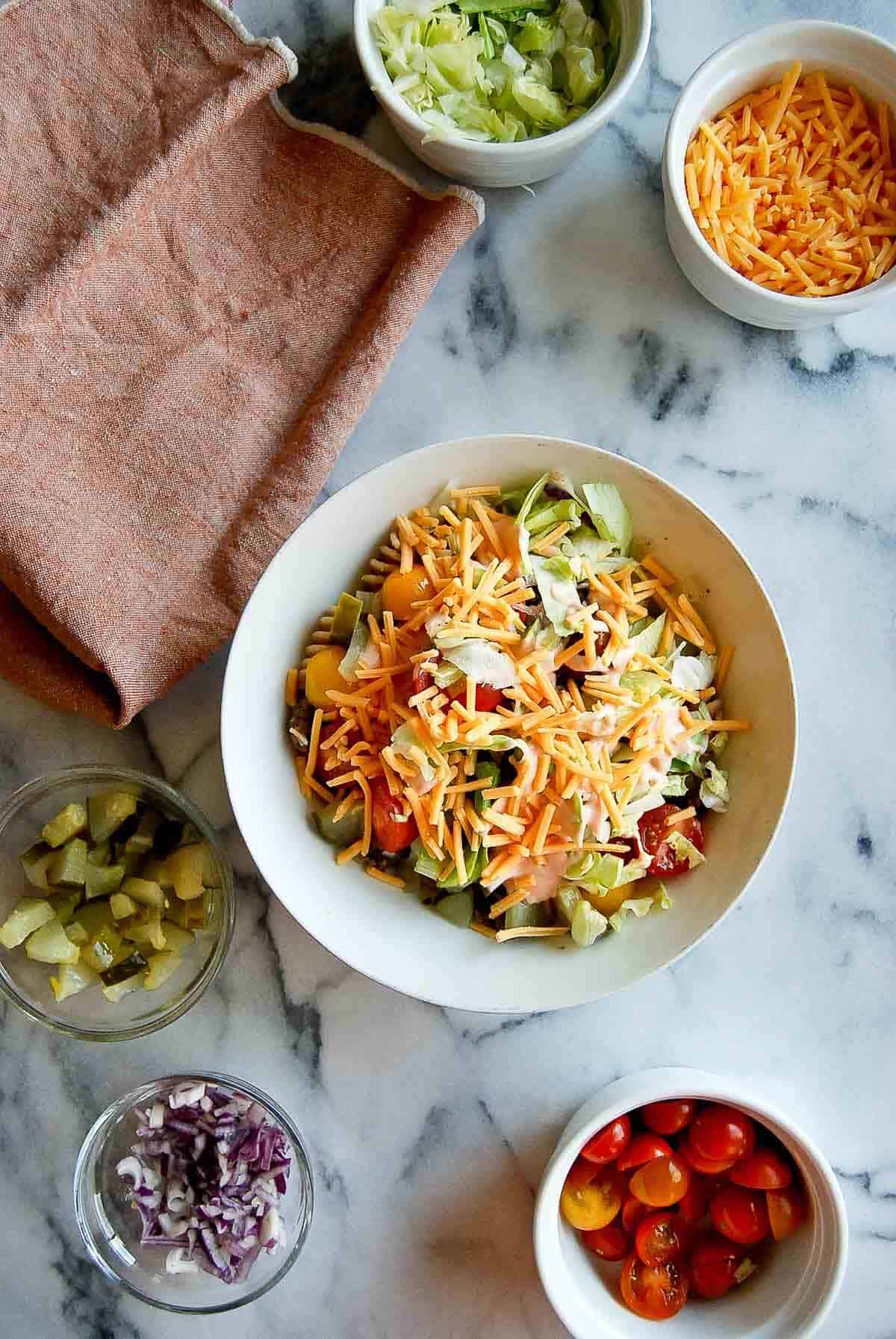 Jimmy Buffett cheeseburger pasta salad in bowl.