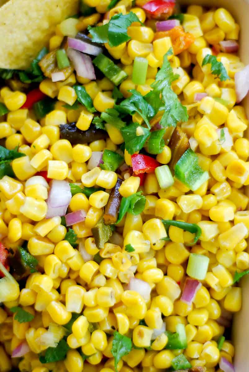 Roasted chipotle corn salsa in bowl, closeup.