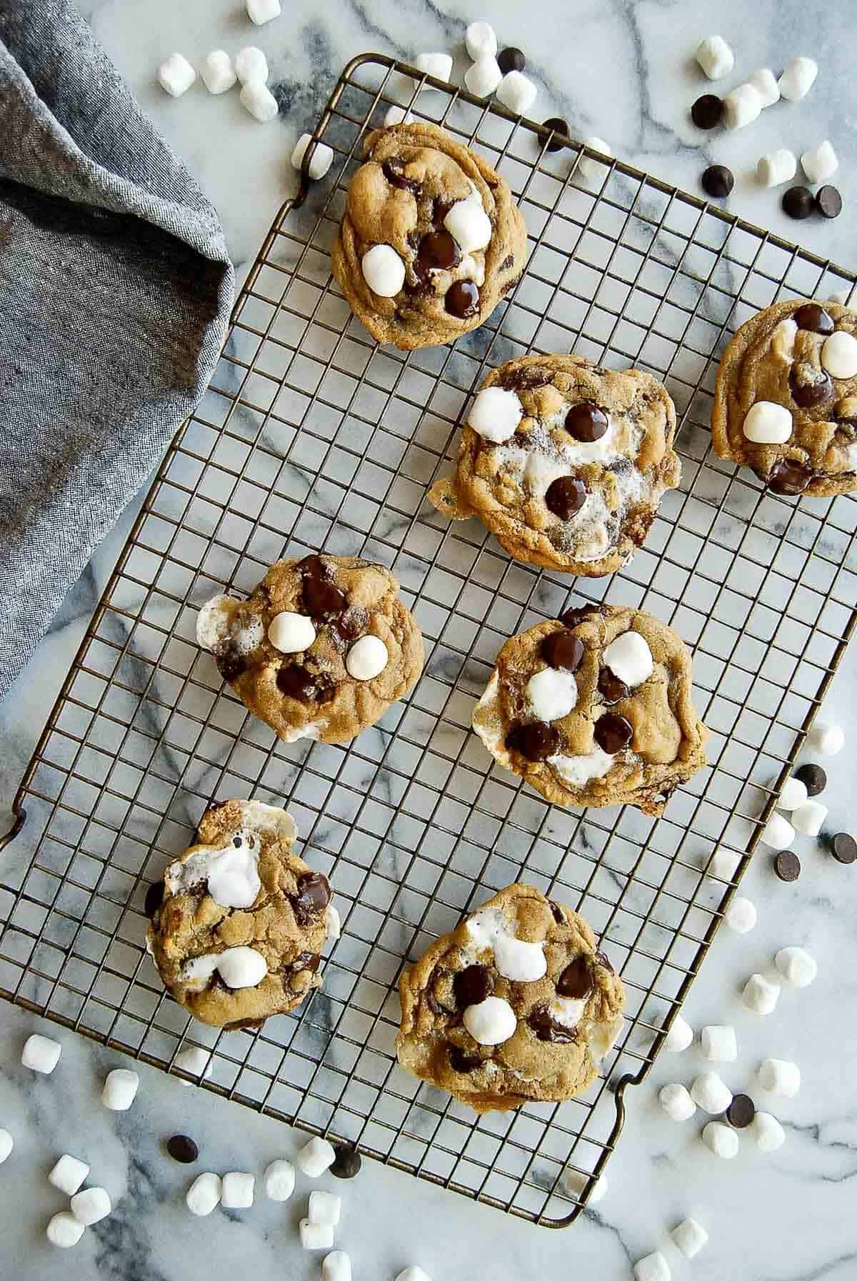 chocolate chip marshmallow cookies on cooling rack.