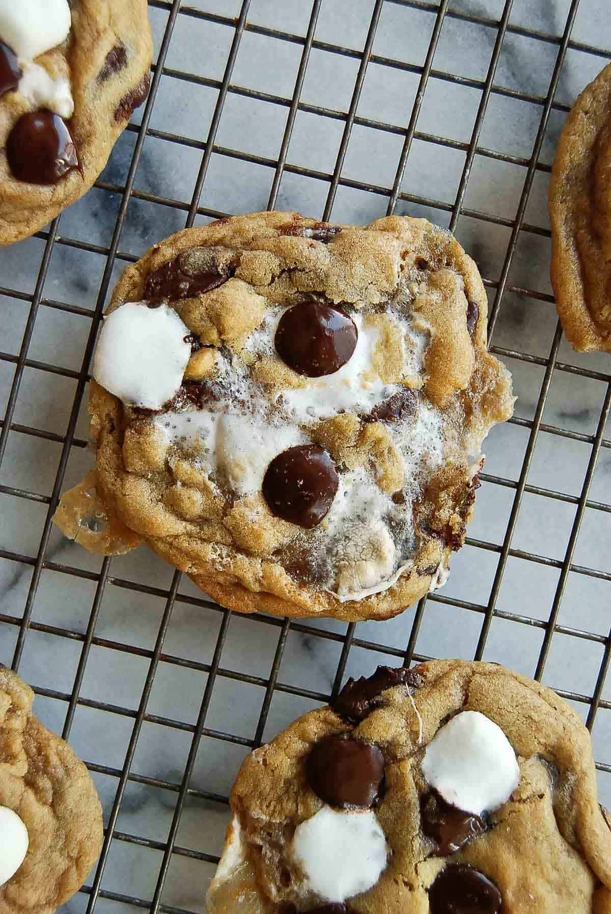 chocolate chip marshmallow cookies on cooling rack.