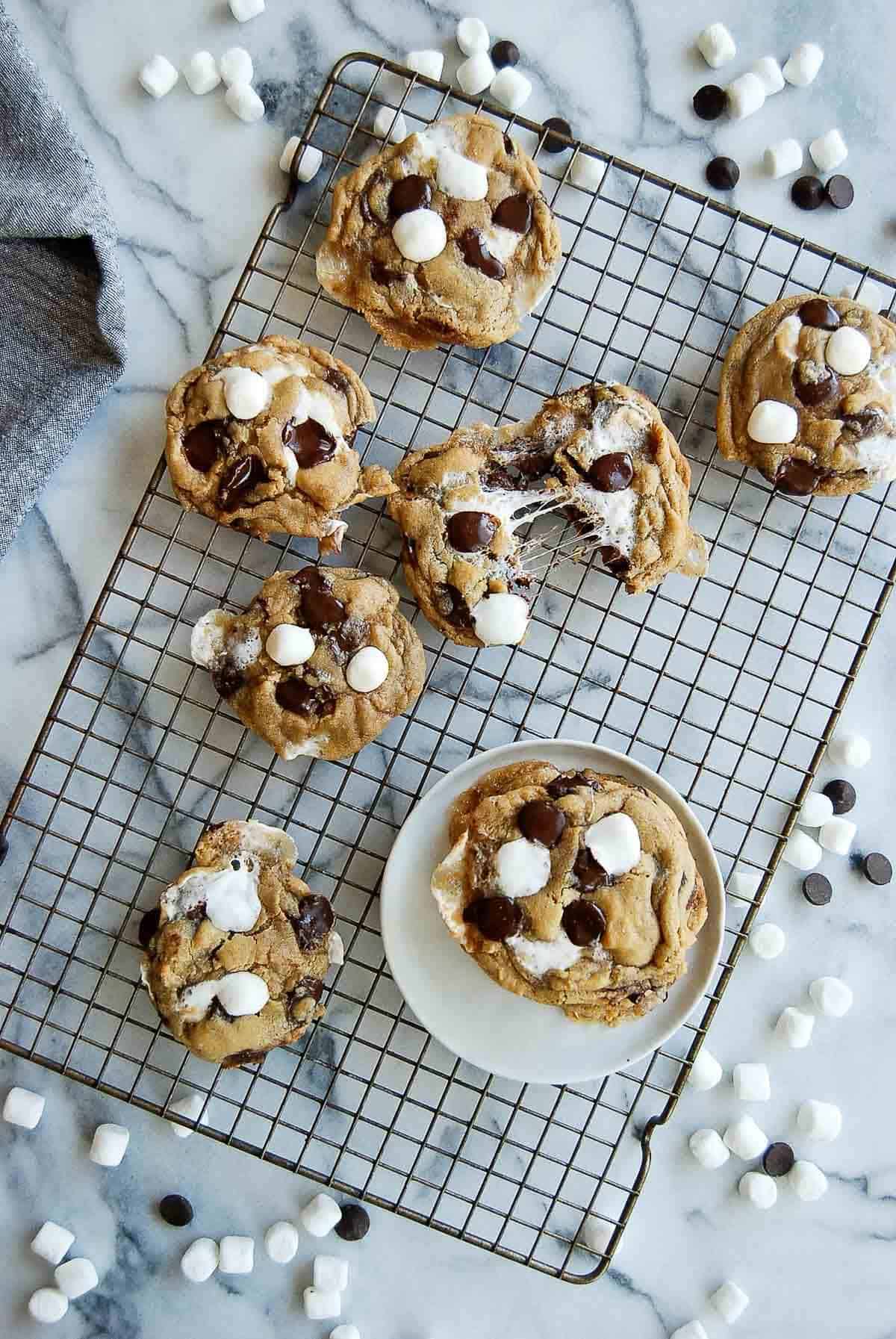 chocolate chip marshmallow cookies on cooling rack.