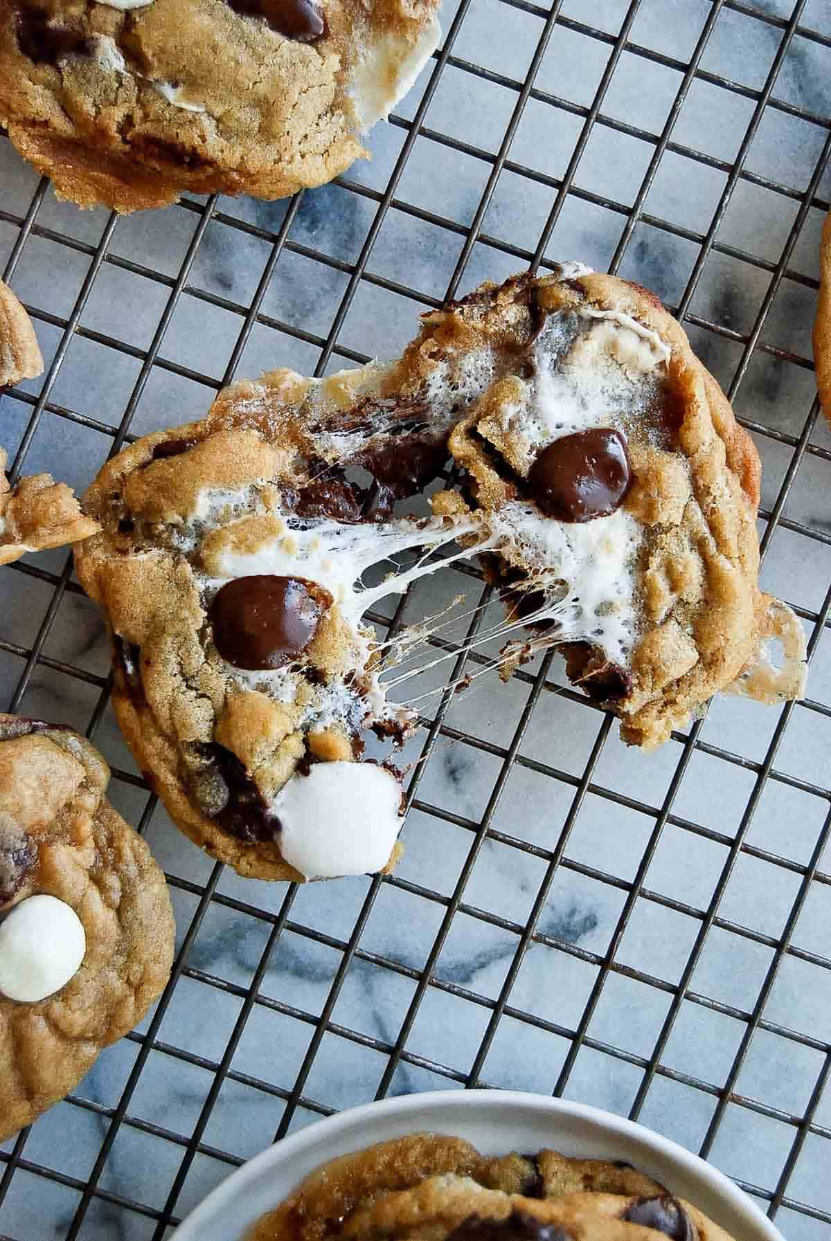 chocolate chip marshmallow cookie pulled apart.