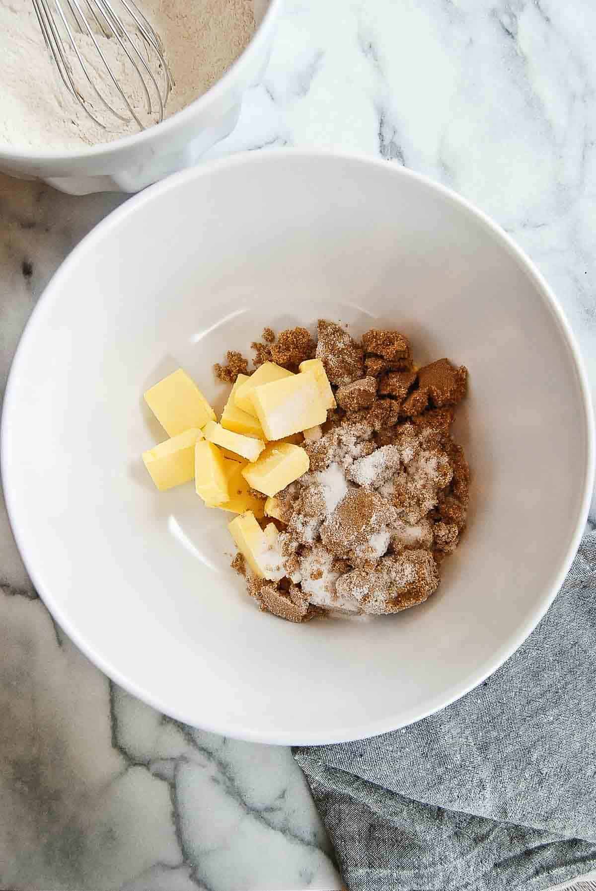 butter, brown sugar and granulated sugar in bowl.