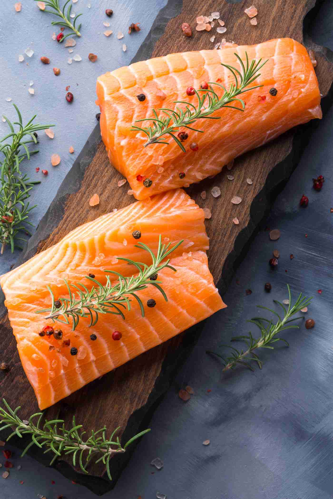 raw salmon on cutting board.