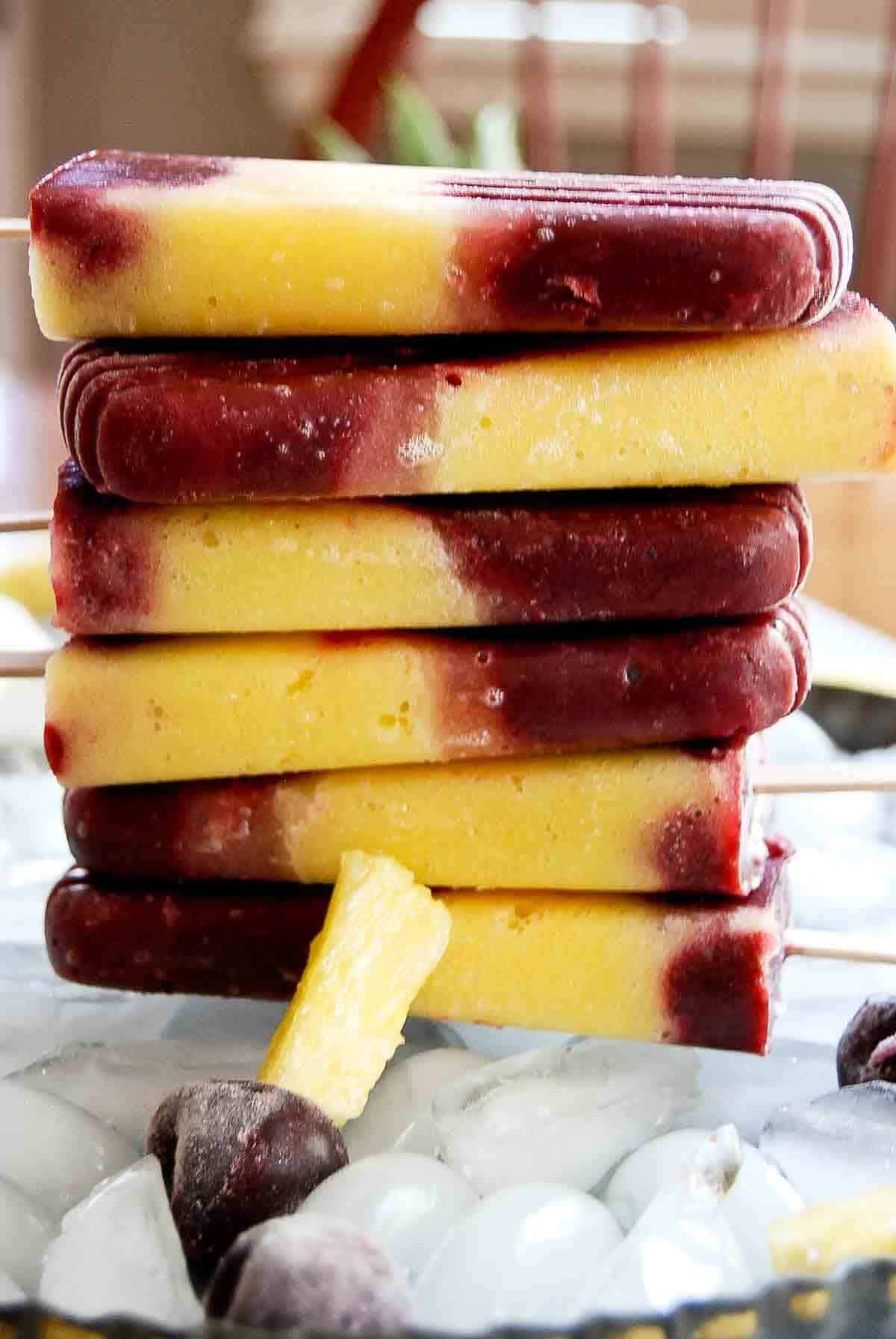 stack of cherry pineapple ice pops.