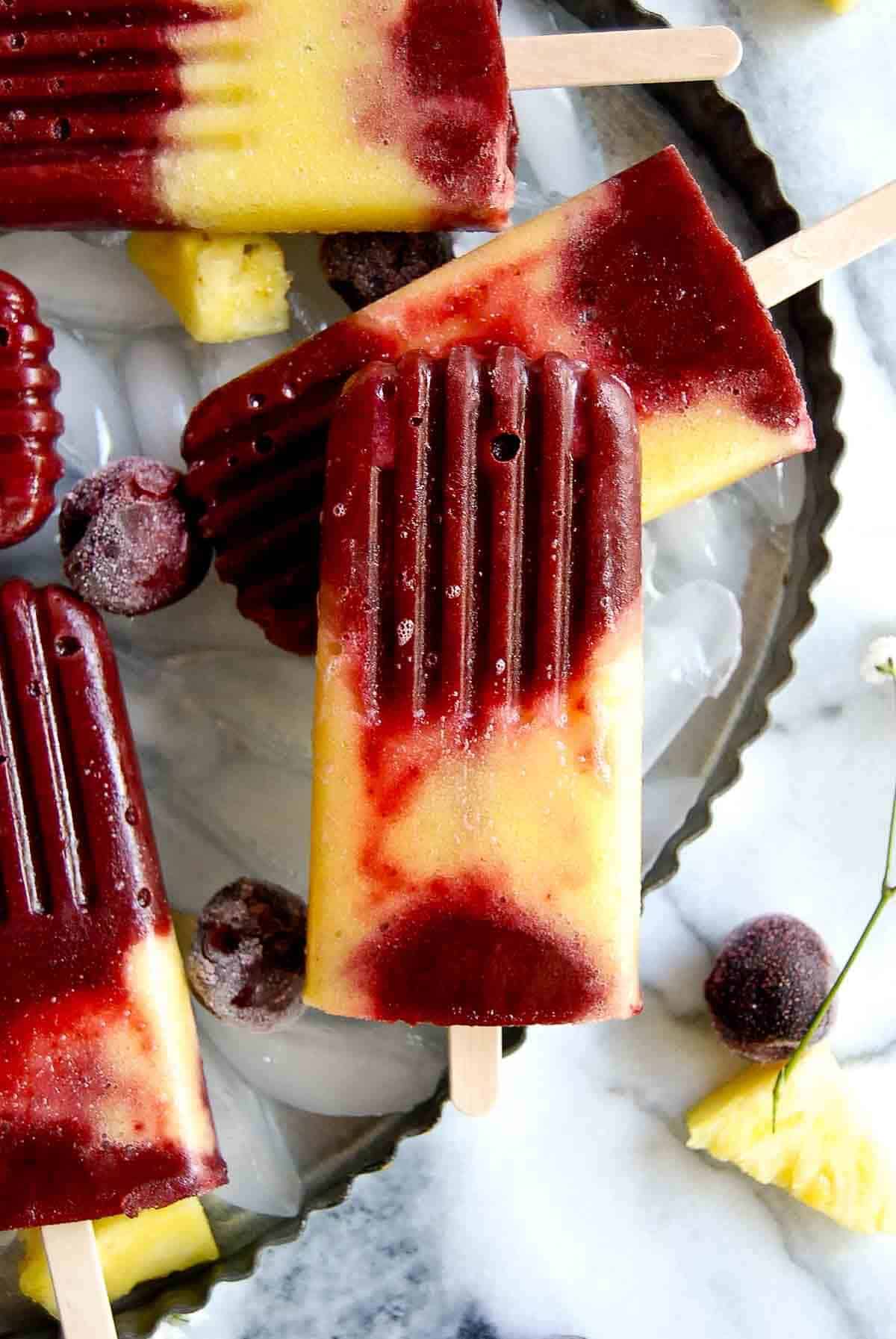 cherry pineapple and vanilla popsicle.