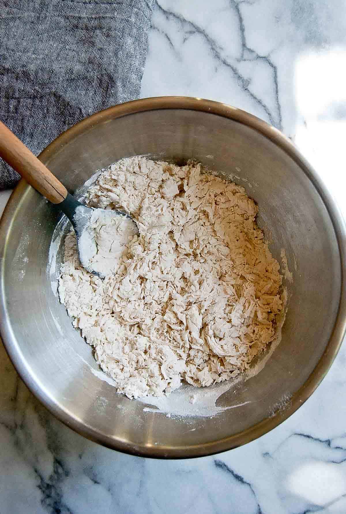 shaggy dough for salt bagel in a bowl.