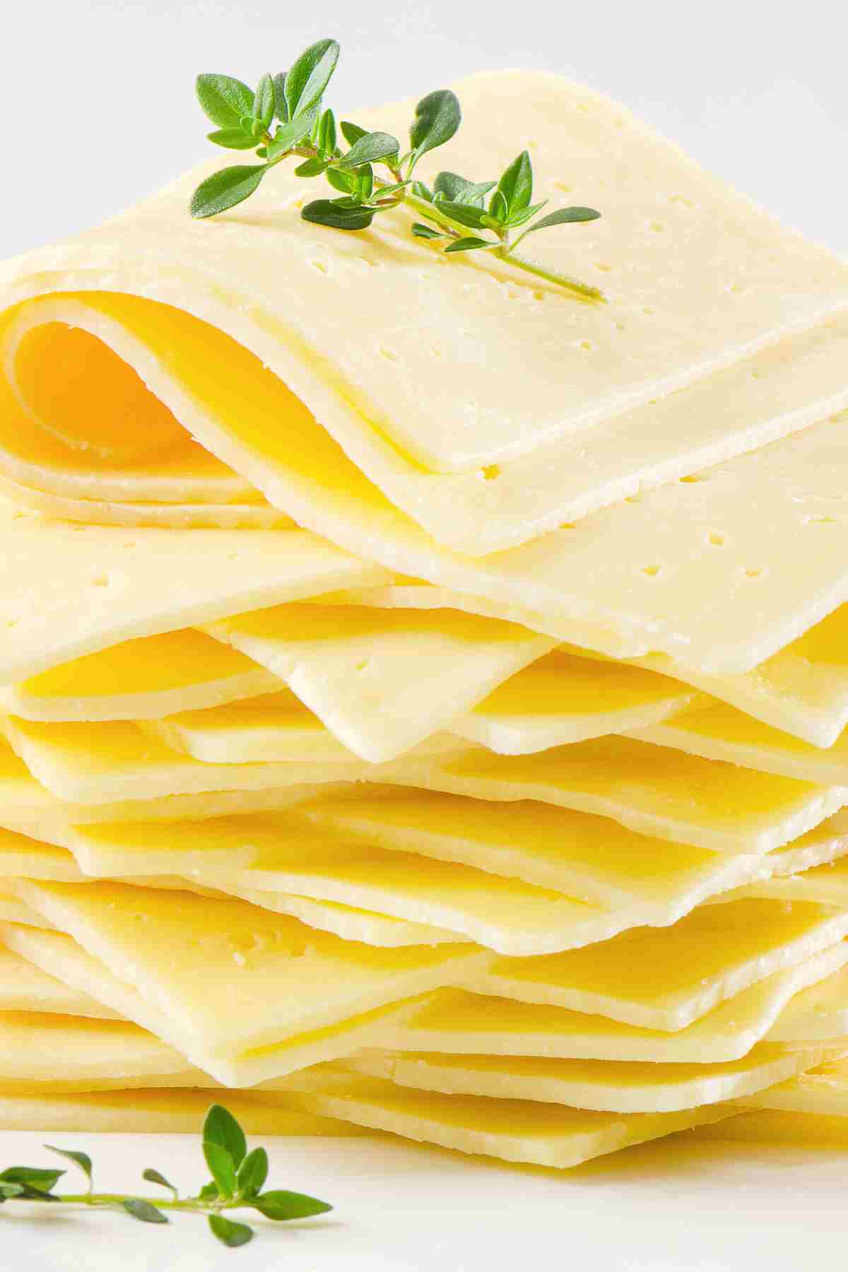 cheese slices in a pile.