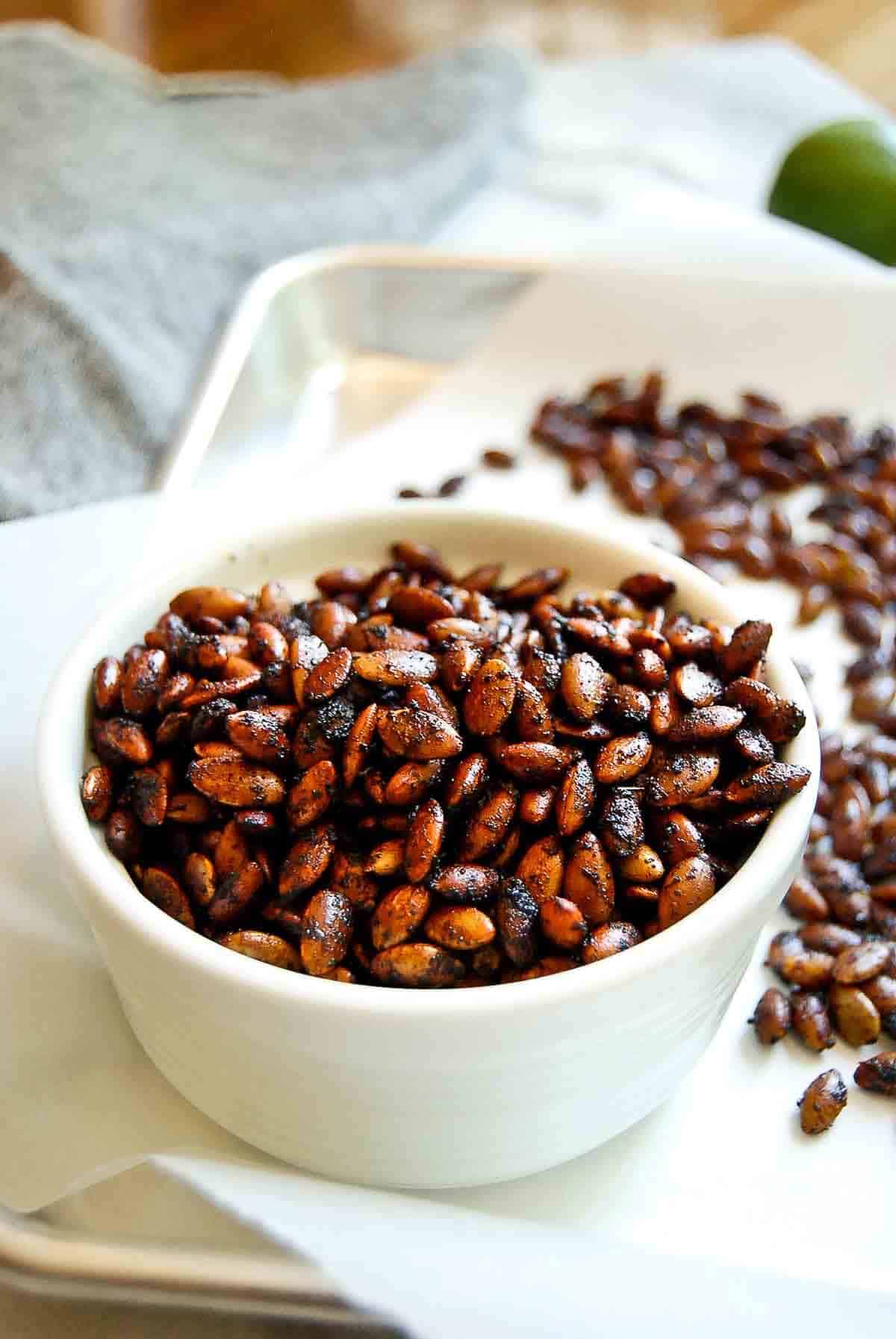 closeup of chili lime roasted pepitas in bowl.