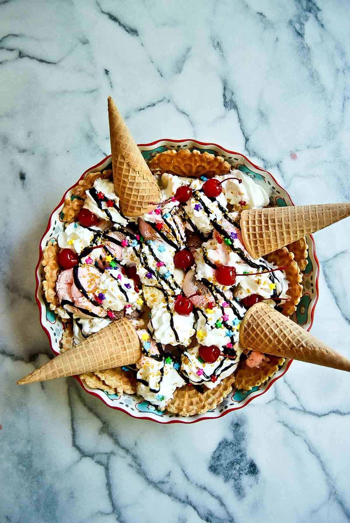 ice cream nachows with sugar cones on the side.