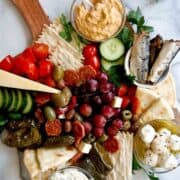 mediterranean charcuterie board on counter.
