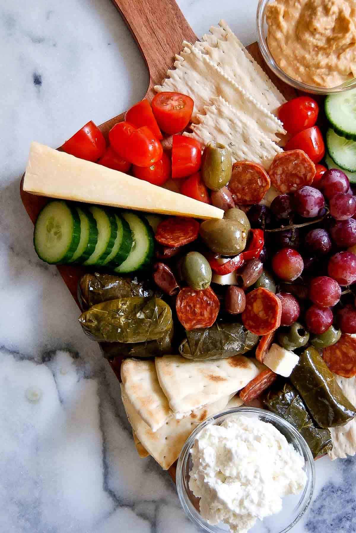 closeup of mediterranean charcuterie board on counter.