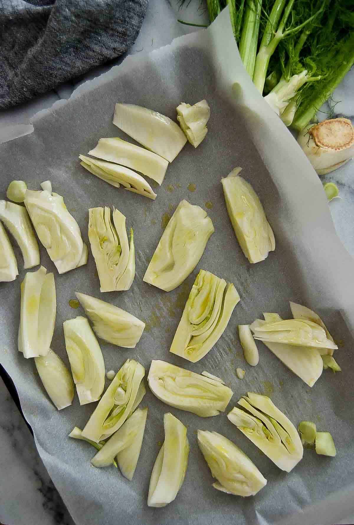 fennel wedges on baking tray.