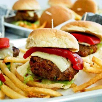 spanish slider on tray with french fries.