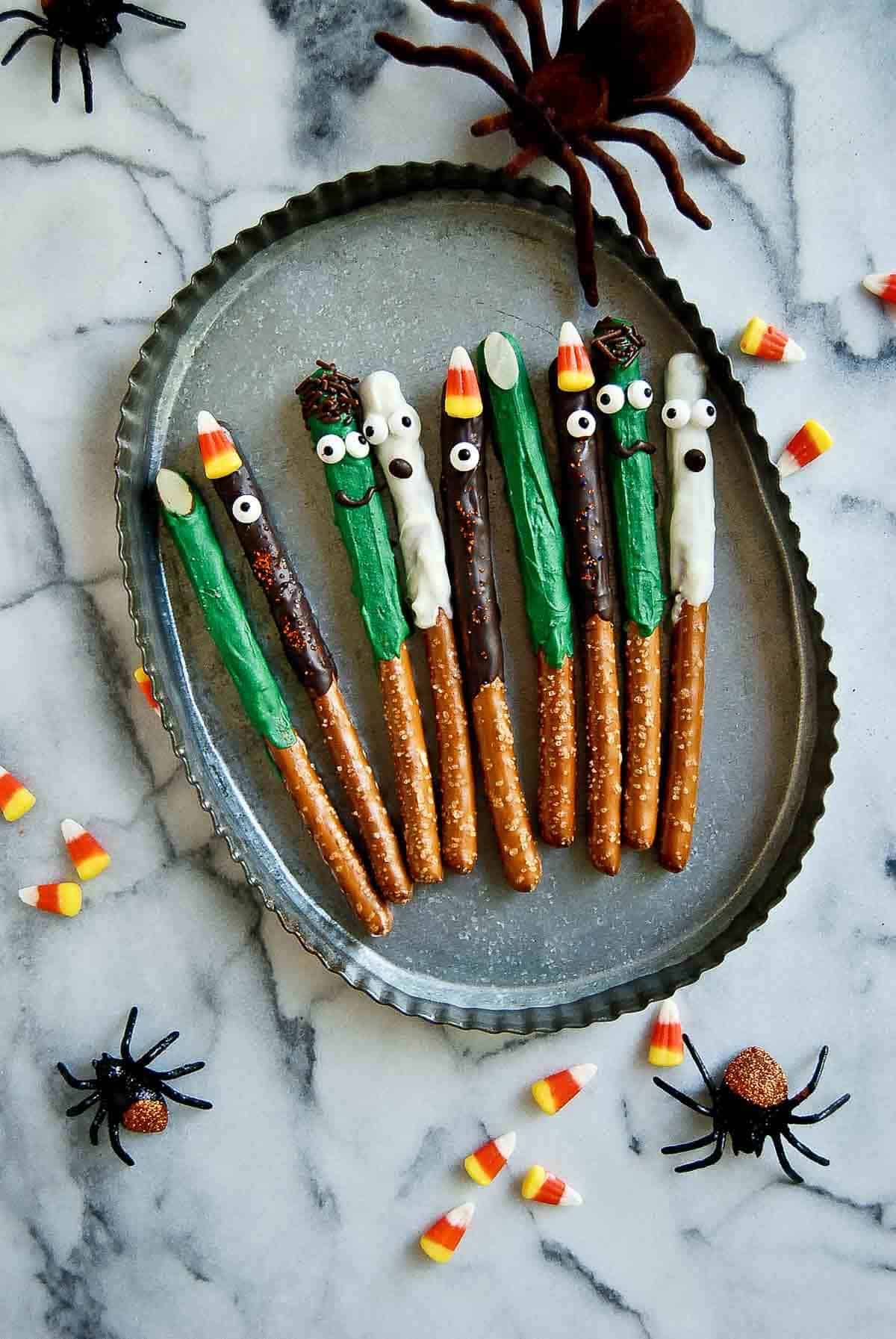 halloween pretzel rods on tray - witch fingers, monsters, ghosts and frankensteins.