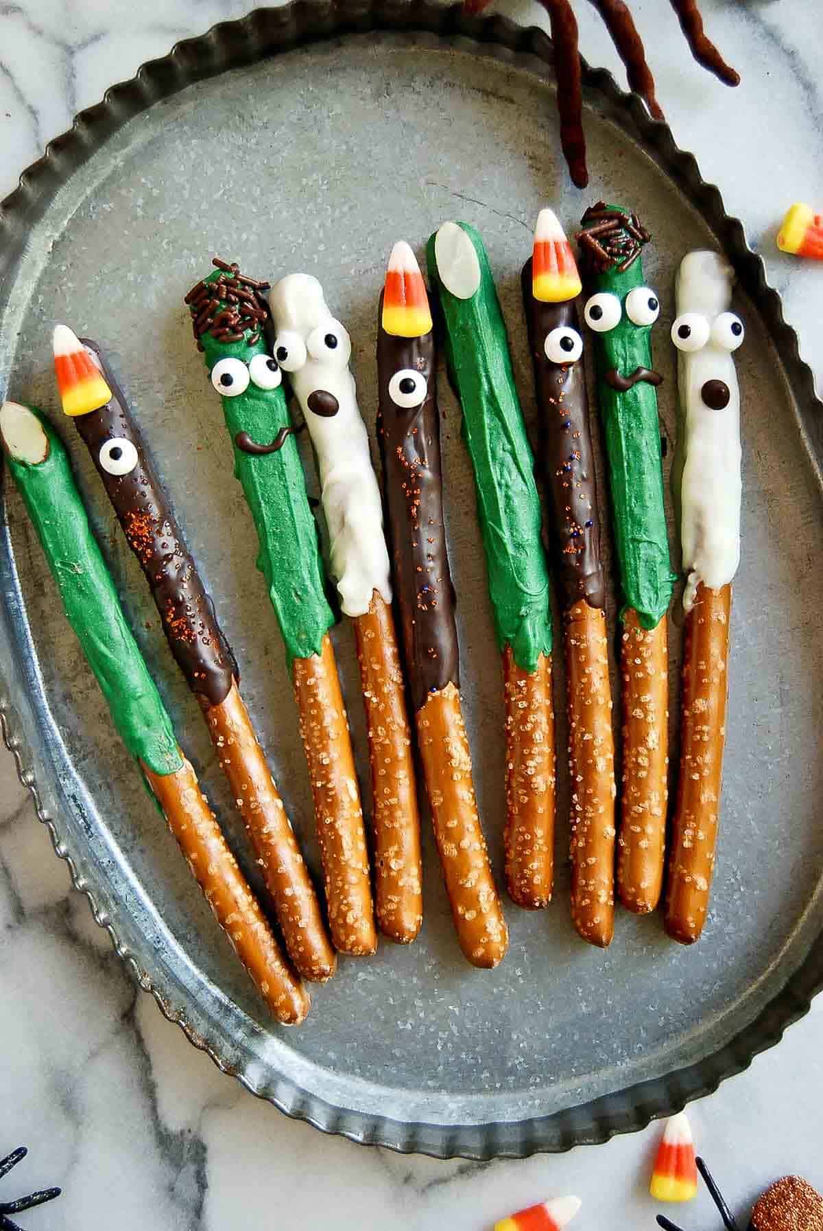 halloween pretzel rods on tray - witch fingers, monsters, ghosts and frankensteins.