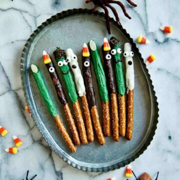 halloween pretzel rods on tray - witch fingers, monsters, ghosts and frankensteins.