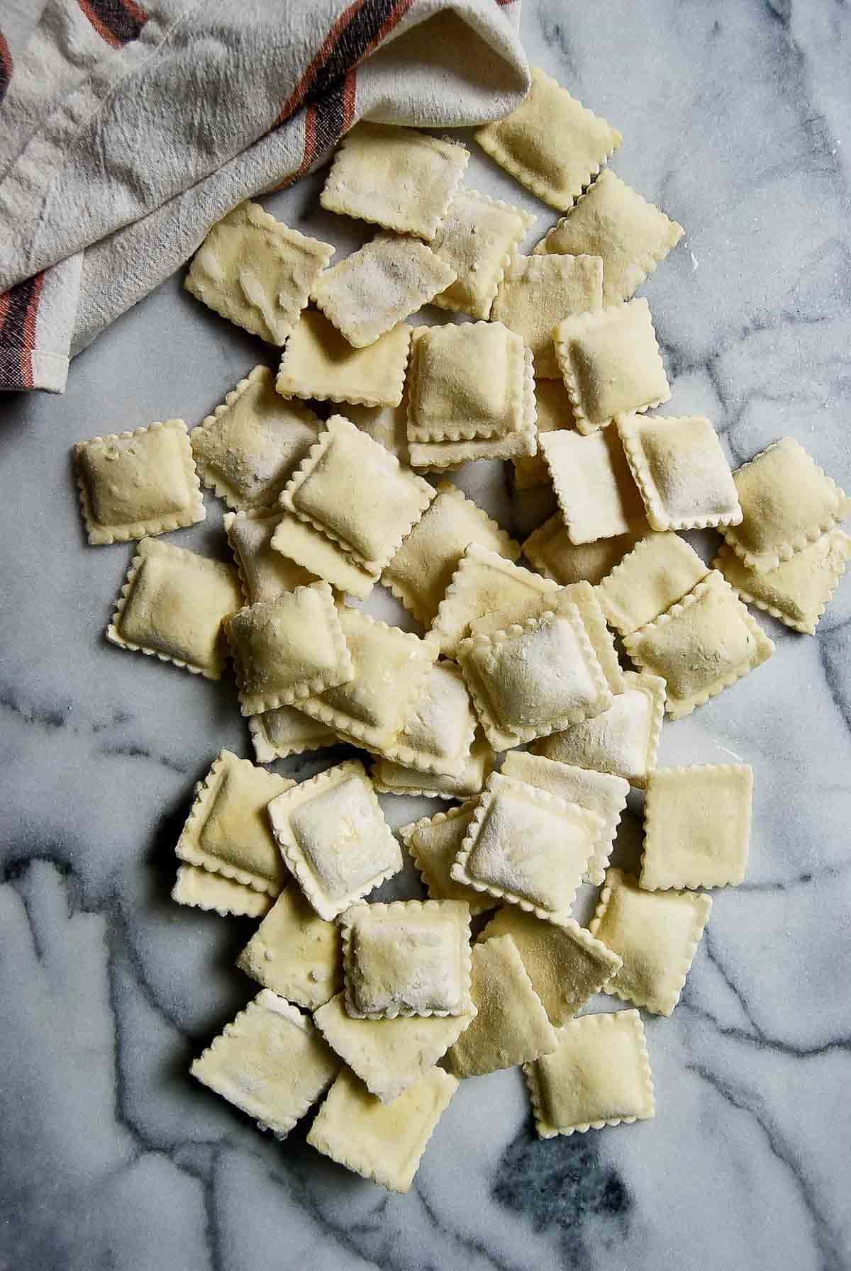 frozen cheese ravioli on counter.