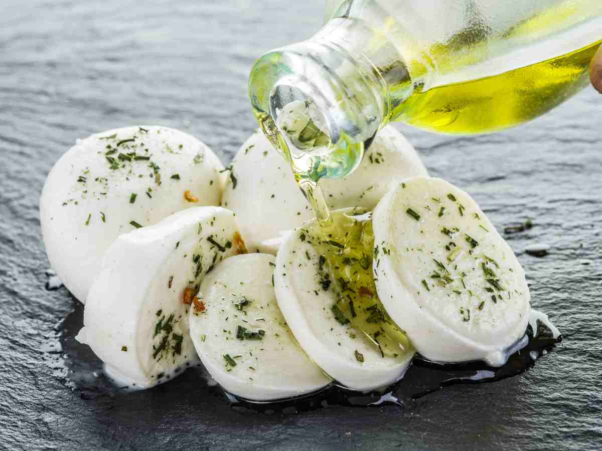 mozzarella cheese with olive oil and herbs.