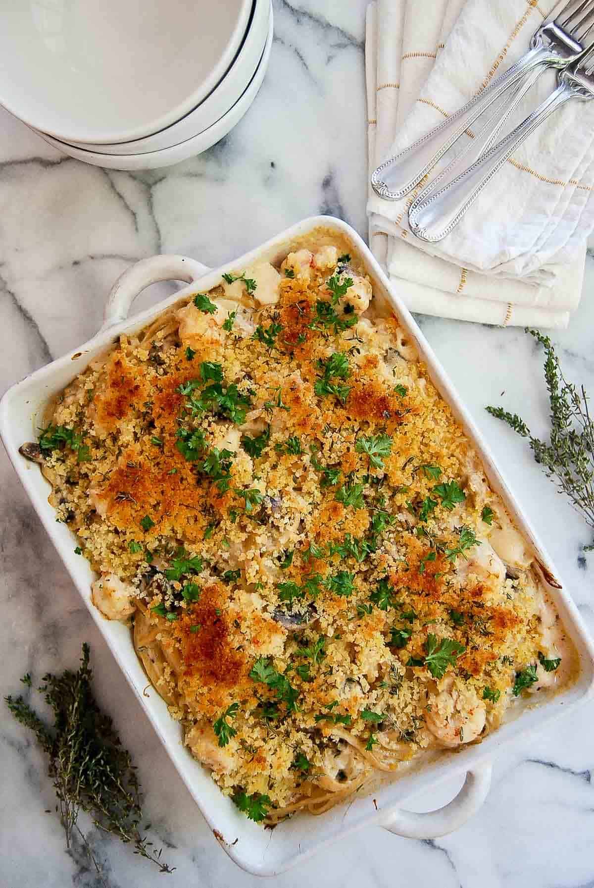 seafood tetrazzini in baking dish on countertop.