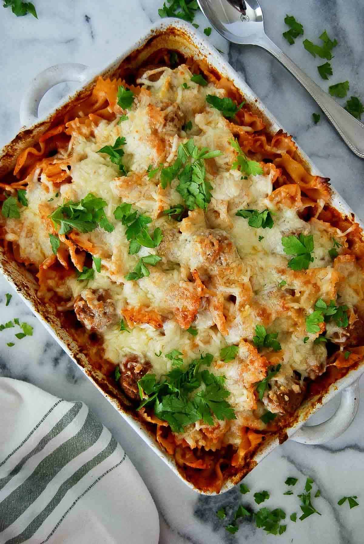 dump and bake meatball casserole in casserole dish on countertop.