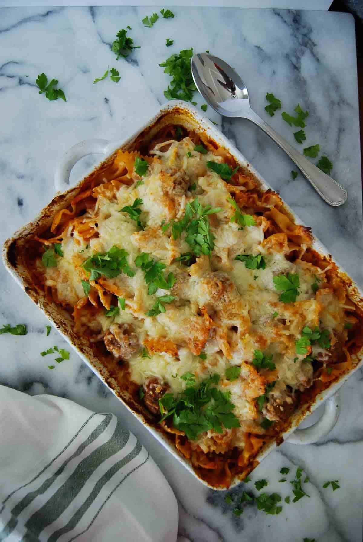 dump and bake meatball casserole in casserole dish on countertop.