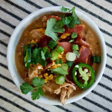 bowl of crack chicken chili on placemat.