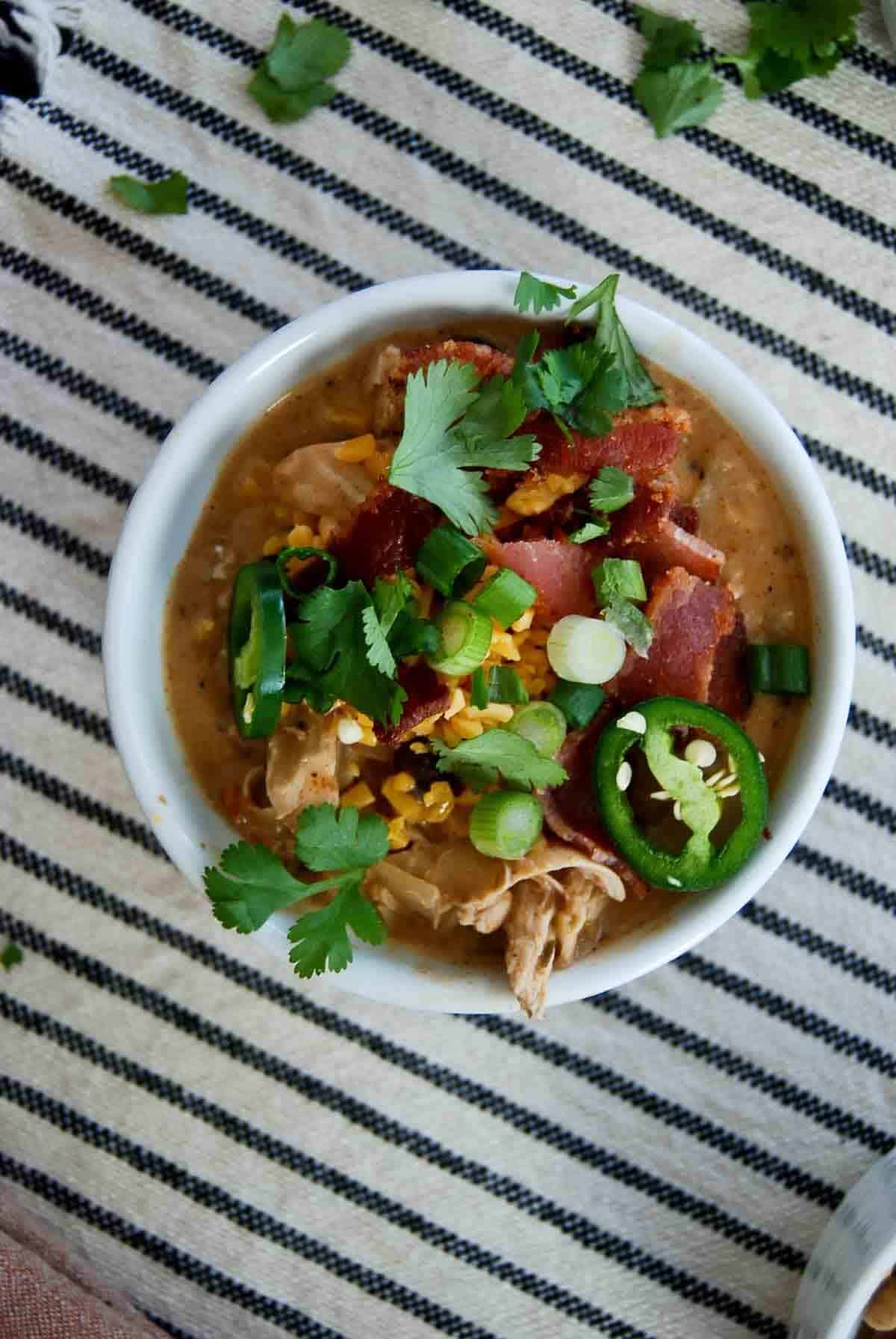 closeup of bowl of crack chicken chili.