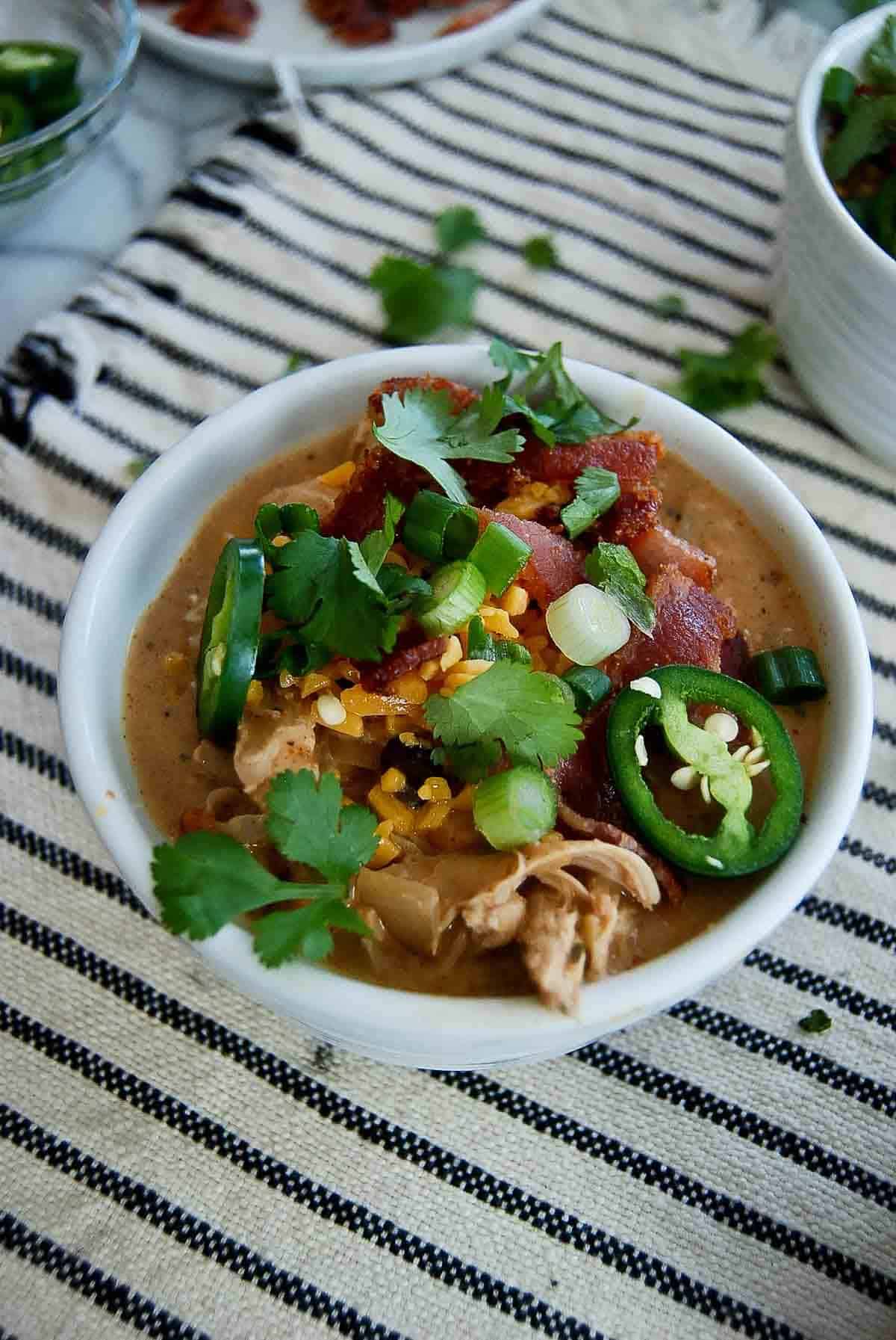 side view of crack chicken chili in bowl.