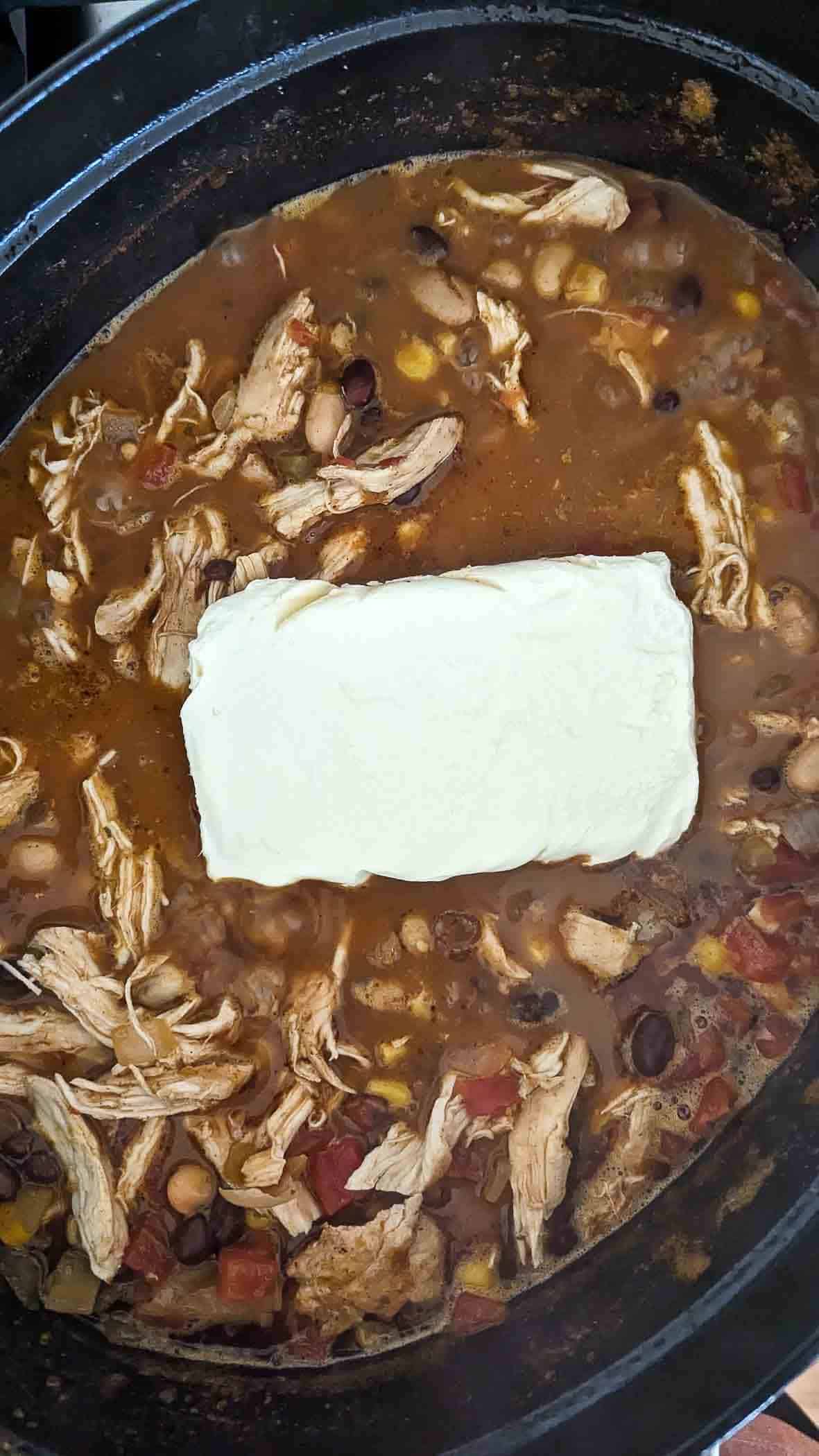 cream cheese added to crack chicken chili.