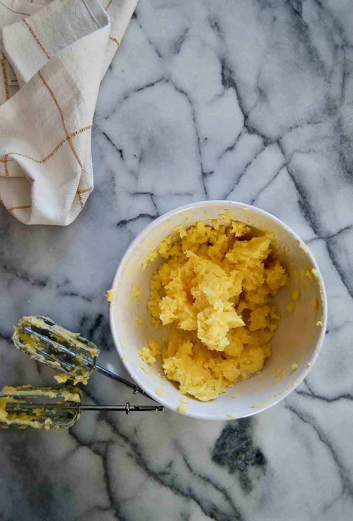 creamed butter and sugar in bowl.