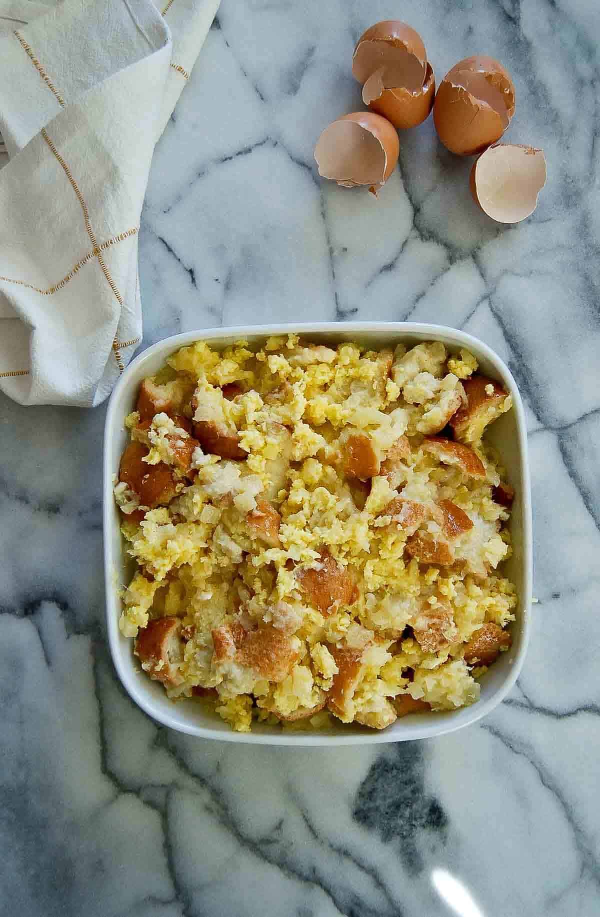 pineapple and bread mixture in baking dish.