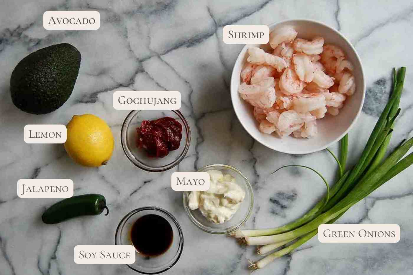 ingredients for spicy shrimp salad on cutting board.