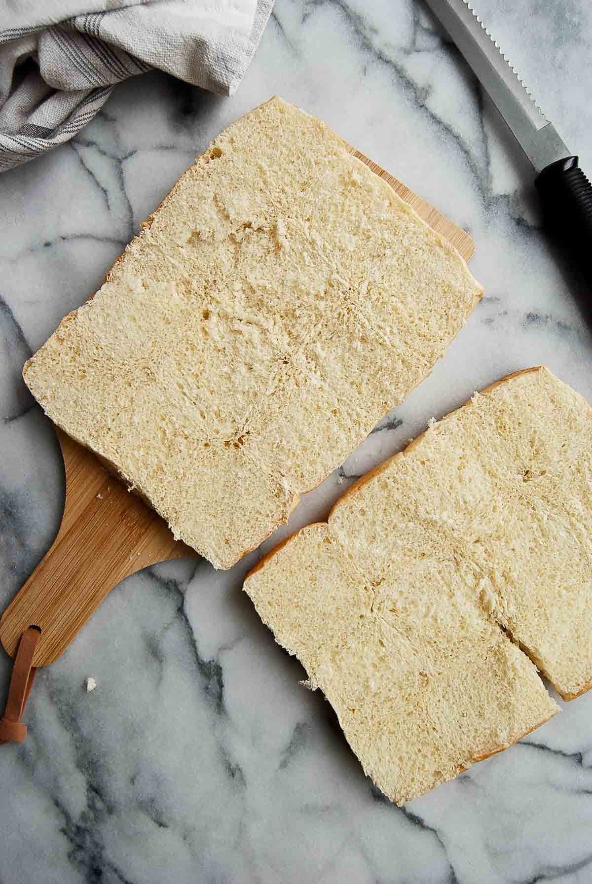 top and bottom half of the kings hawaiian roll slabs.
