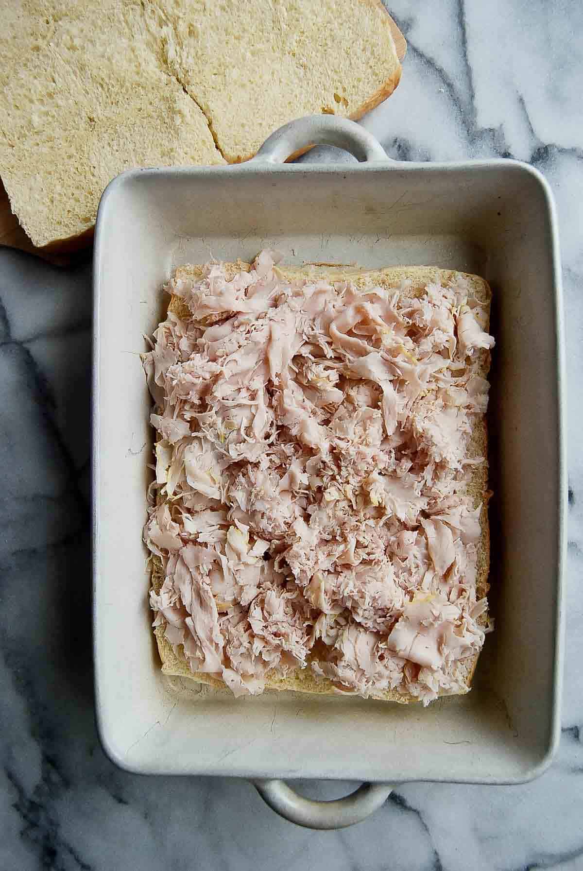 rolls with turkey added to the top.