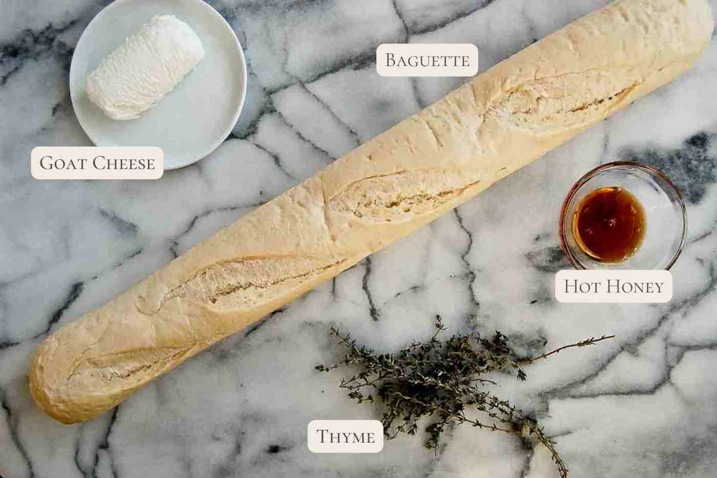 ingredients for goat cheese crostini on cutting board.