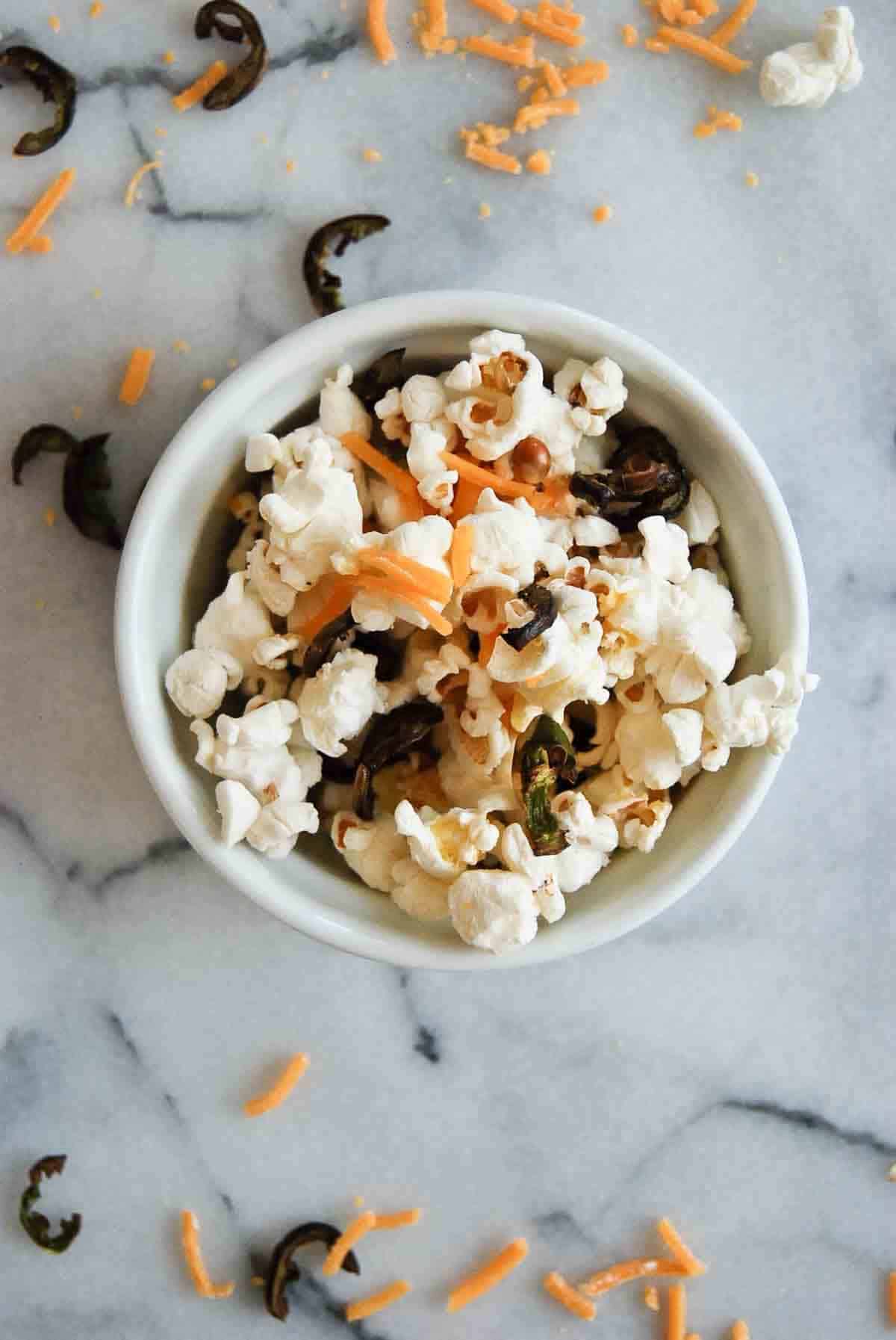 closeup of single serving of jalapeno cheddar popcorn recipe.