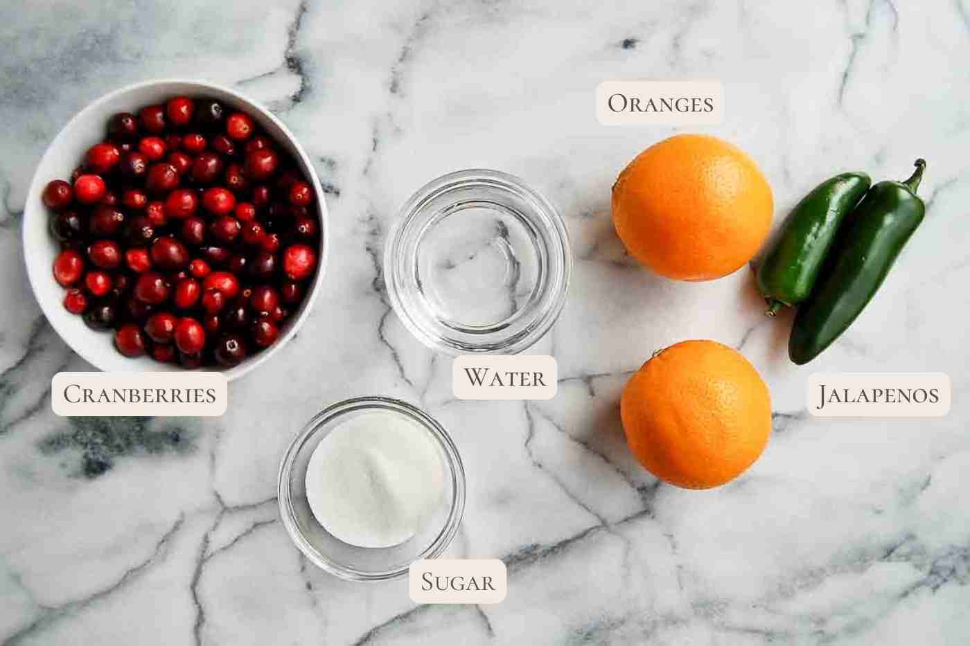 ingredients for jalapeno cranberry sauce on countertop.