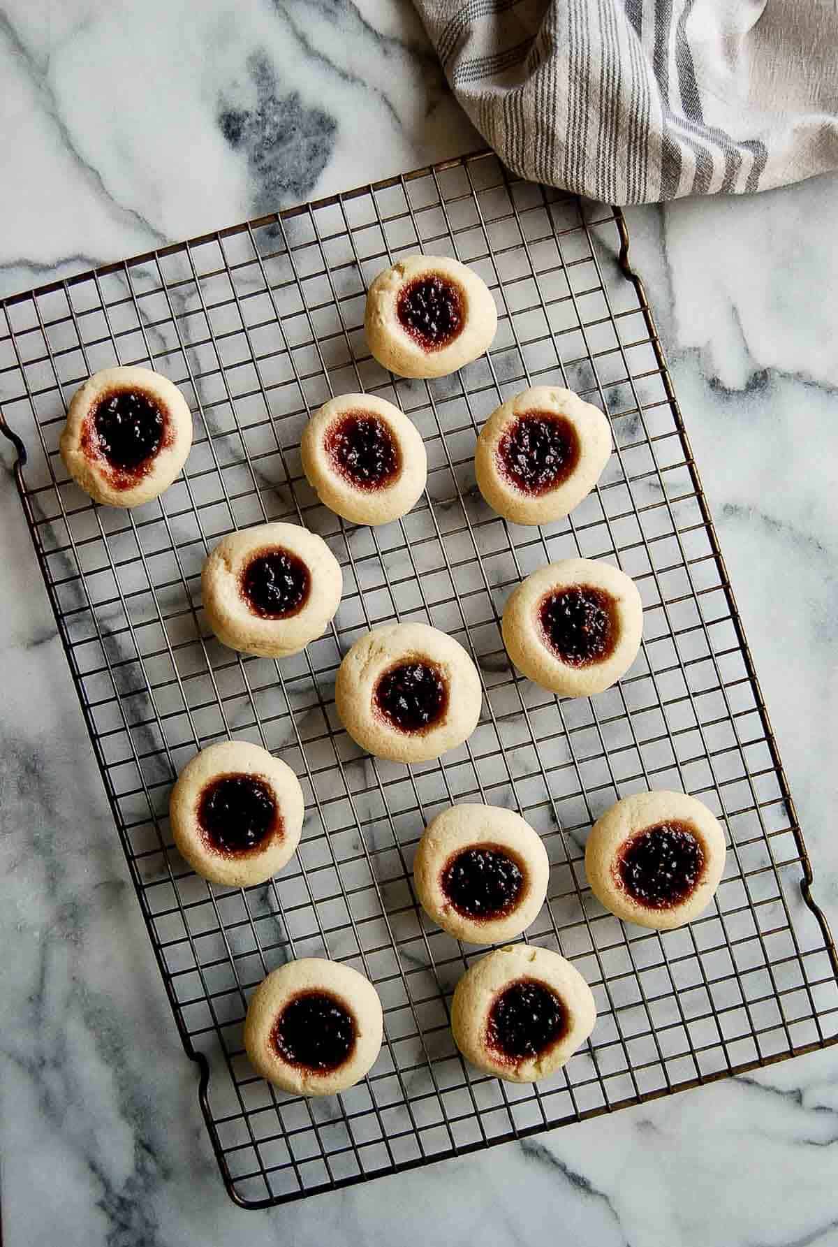 cooked thumbprint cookies filled with raspberry jam.