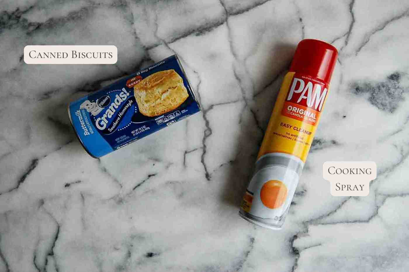 ingredients for air fryer biscuits on cutting board, labeled.