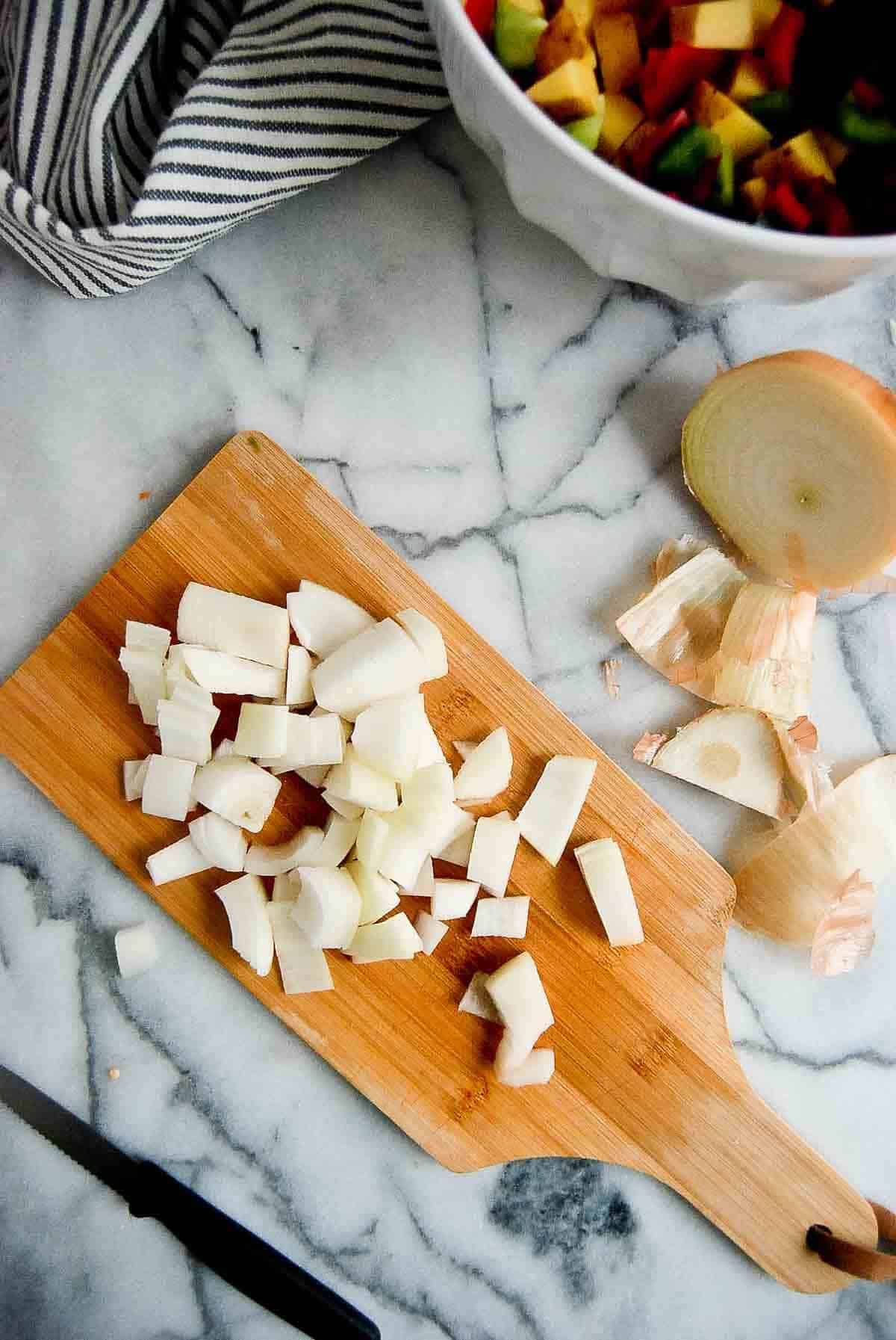 diced onion on cutting board.