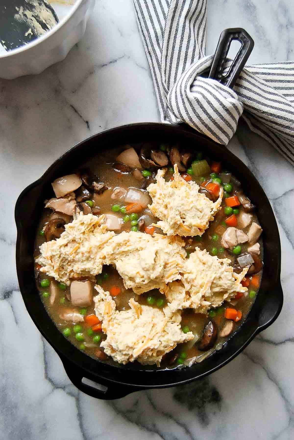 dollops of batter added to chicken cobbler.