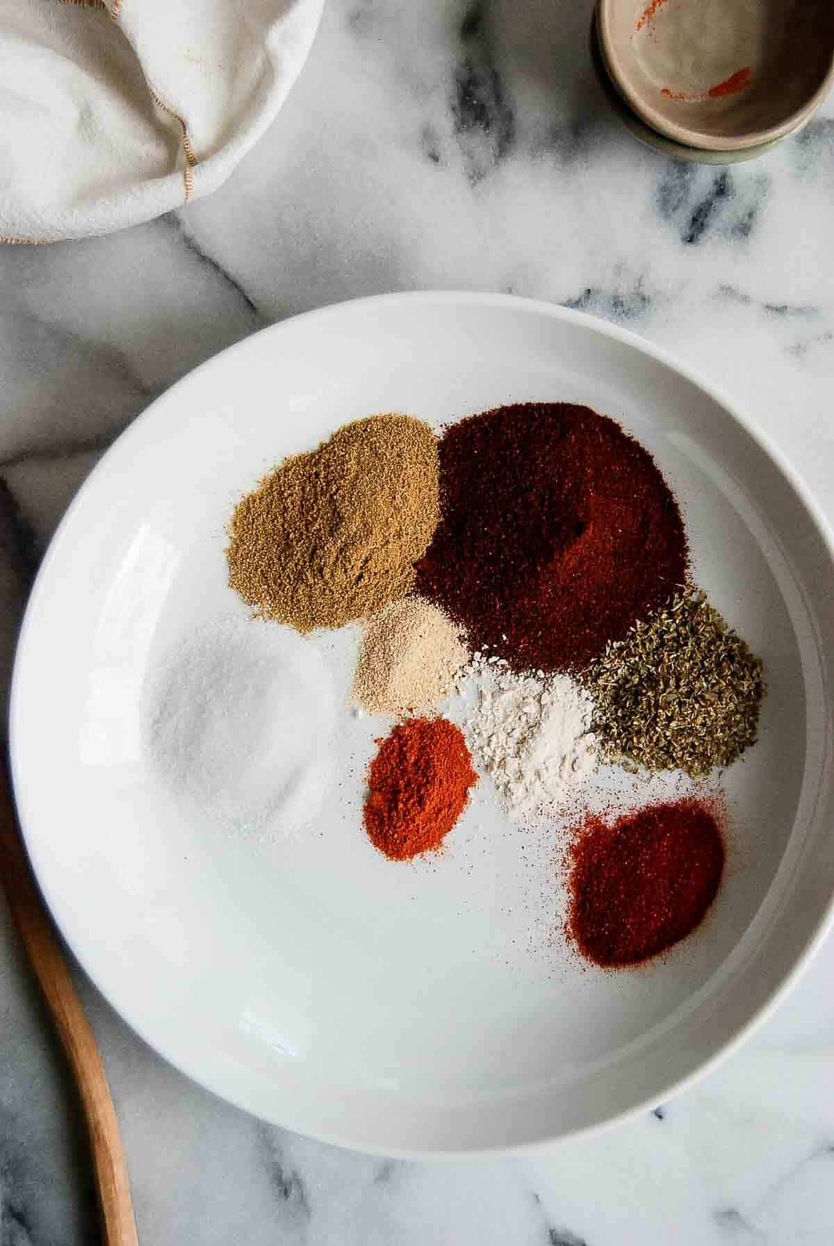 closeup of spices for chicken taco seasoning in bowl.