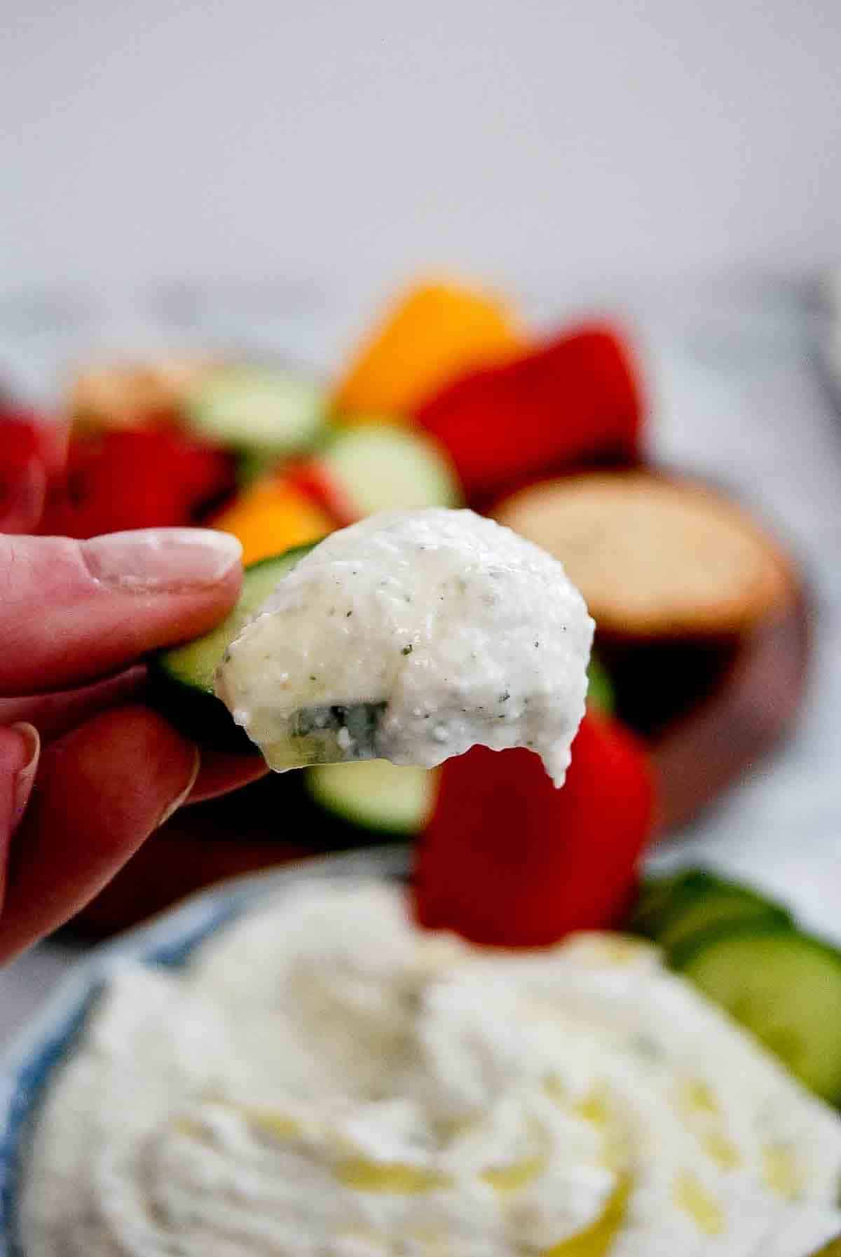 cucumber dipped in cottage cheese ranch dip.